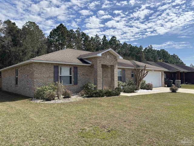 ranch-style home with central AC unit, driveway, an attached garage, a front lawn, and brick siding