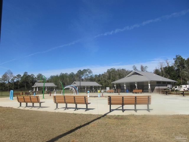 view of home's community with a yard