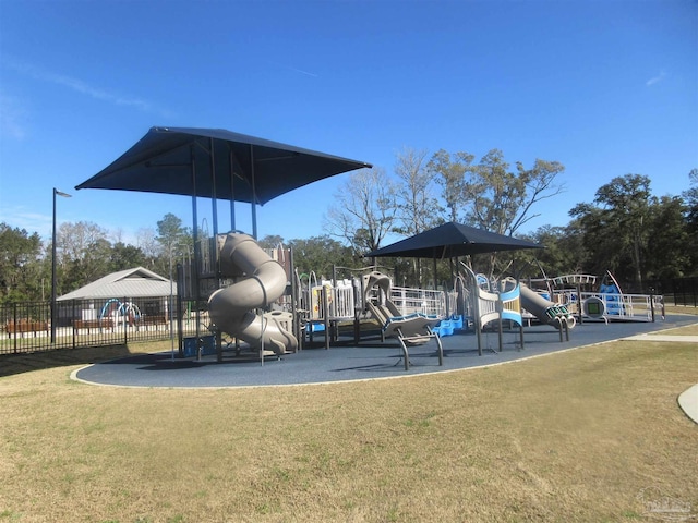 view of playground featuring a lawn