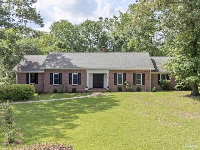 500 Timber Ridge Dr, Pensacola, FL 32534 - ranch-style house with brick siding, a shingled roof, and a front lawn