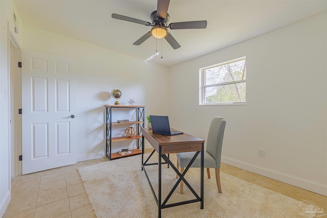 office with light tile patterned floors, baseboards, and ceiling fan