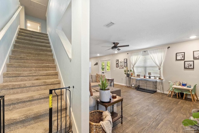 4678 Perception Cir, Milton, FL 32570 - staircase with a ceiling fan, wood finished floors, and baseboards