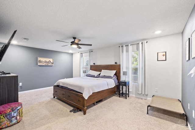 4678 Perception Cir, Milton, FL 32570 - bedroom with a textured ceiling, ceiling fan, light carpet, and baseboards