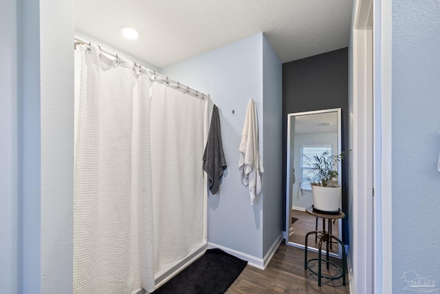 4678 Perception Cir, Milton, FL 32570 - full bathroom with wood finished floors and baseboards