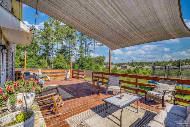 4678 Perception Cir, Milton, FL 32570 - wooden deck with fence and an outdoor hangout area