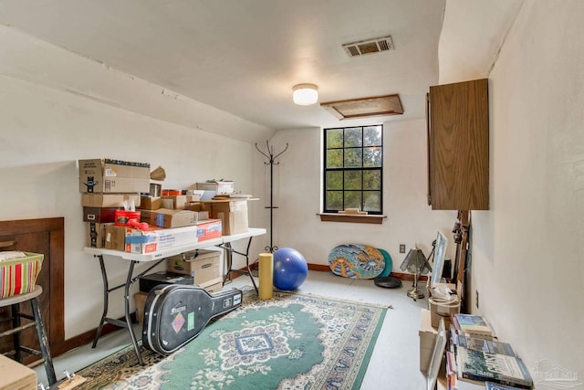 storage featuring attic access and visible vents