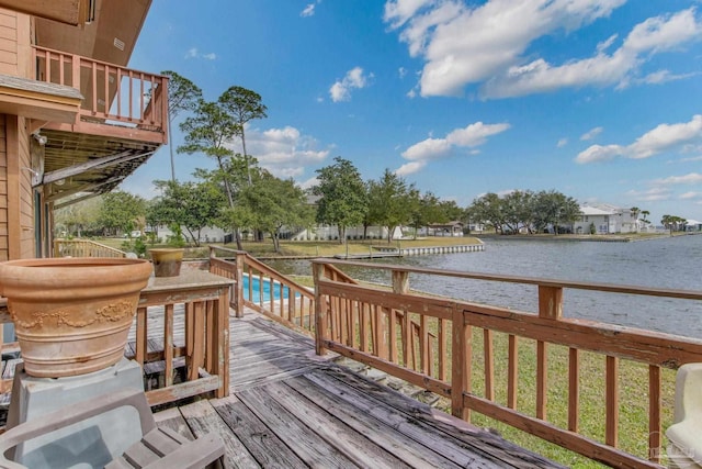 deck featuring a water view