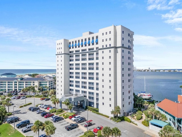 view of building exterior featuring a water view