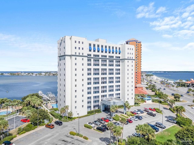 view of building exterior with a water view