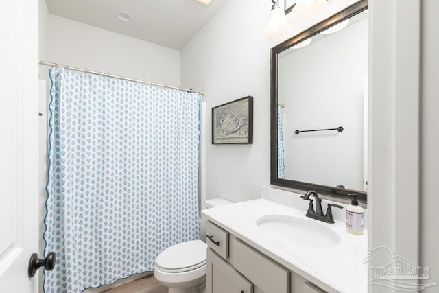 2929 Trestle Way, Cantonment, FL 32533 - bathroom featuring vanity, toilet, and curtained shower