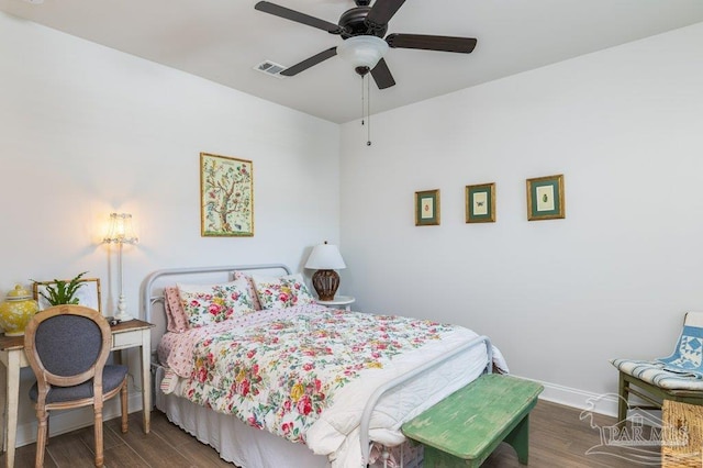 2929 Trestle Way, Cantonment, FL 32533 - bedroom with ceiling fan, baseboards, visible vents, and wood finished floors