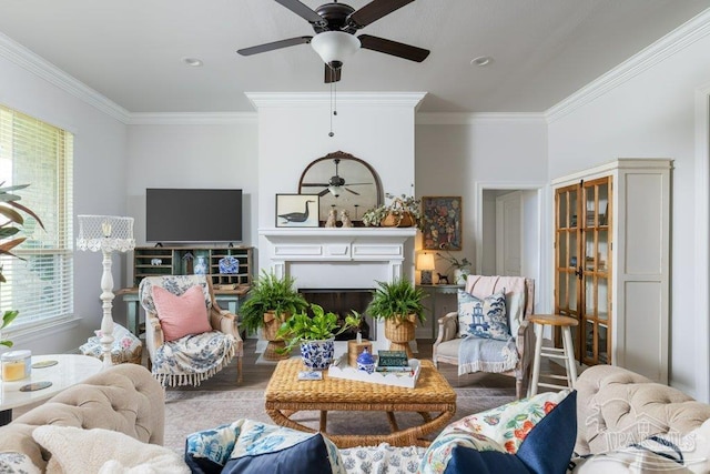 2929 Trestle Way, Cantonment, FL 32533 - living area with ornamental molding, a fireplace, a ceiling fan, and wood finished floors