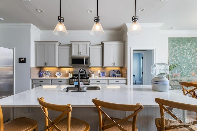 2929 Trestle Way, Cantonment, FL 32533 - kitchen with a sink, appliances with stainless steel finishes, gray cabinets, and crown molding