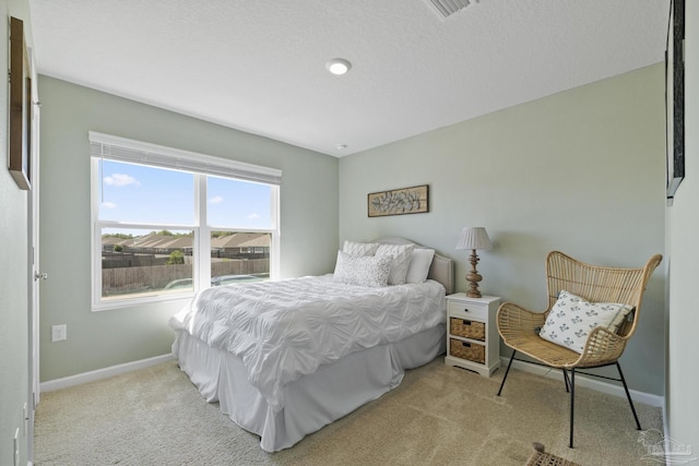 5711 Guinevere Ln, Milton, FL 32583 - bedroom featuring visible vents, baseboards, and carpet