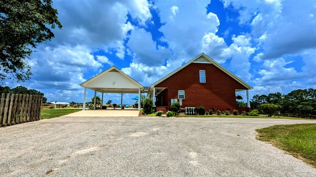 view of front facade featuring a carport