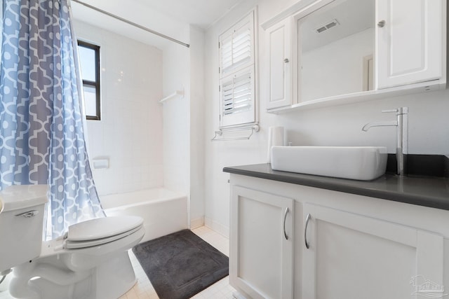 full bath featuring vanity, shower / tub combo, toilet, tile patterned floors, and visible vents