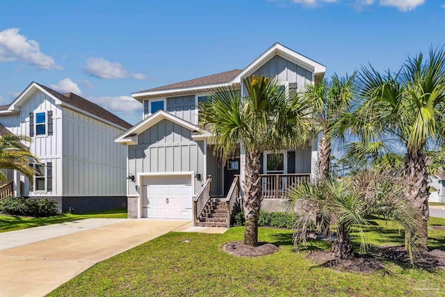 view of front of house featuring a garage and a front yard