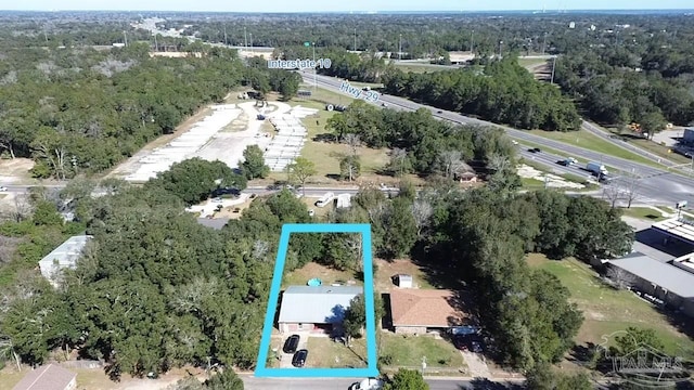 bird's eye view featuring a forest view