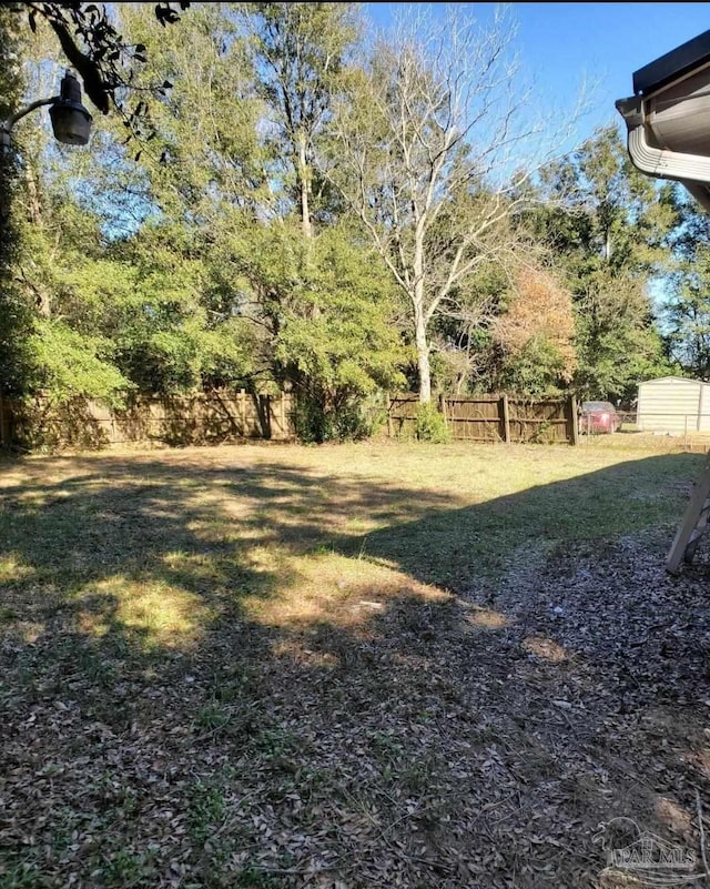 view of yard with fence