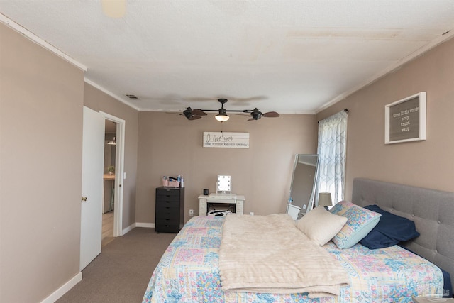 bedroom featuring carpet floors, baseboards, a ceiling fan, and ornamental molding