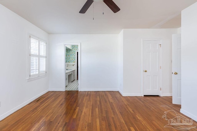 unfurnished room featuring tile patterned flooring and ceiling fan