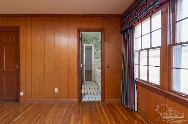 tiled spare room with wooden walls