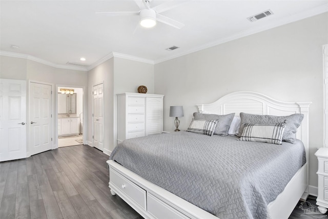 bedroom with ceiling fan, ornamental molding, dark hardwood / wood-style flooring, and ensuite bathroom