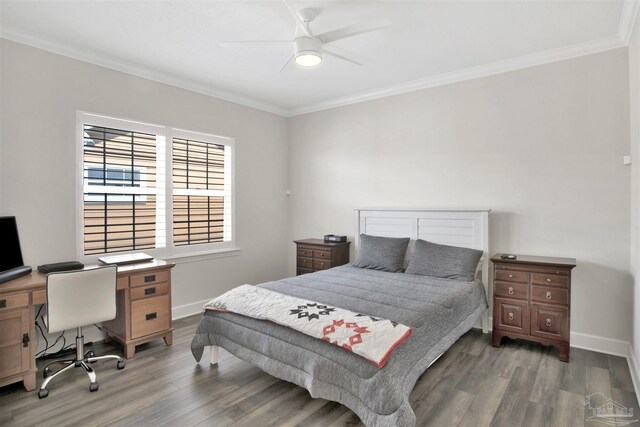 bedroom featuring ornamental molding, ceiling fan, and hardwood / wood-style floors