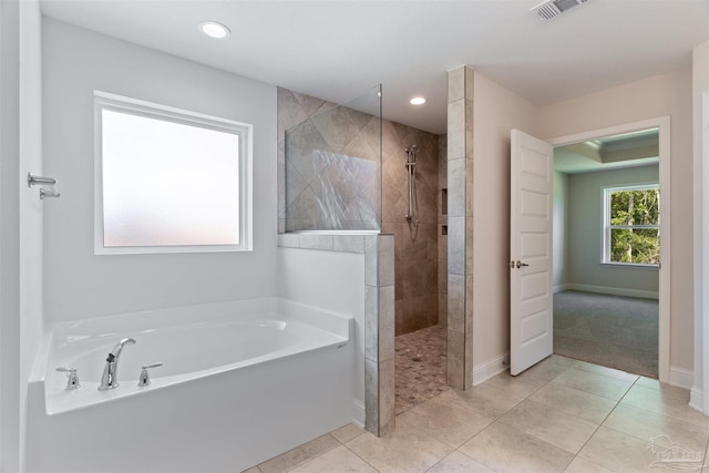 full bath featuring walk in shower, visible vents, recessed lighting, tile patterned flooring, and a garden tub