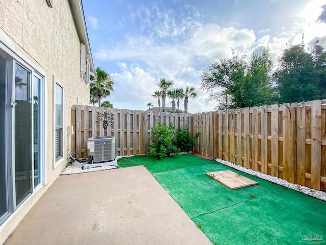 view of patio / terrace with a fenced backyard and cooling unit