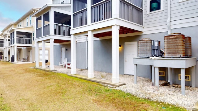 doorway to property featuring a yard