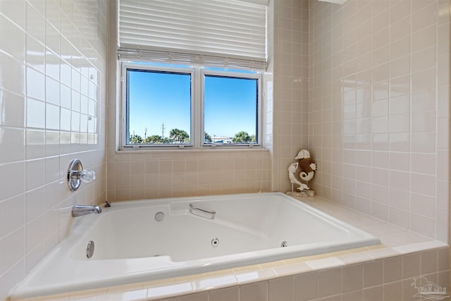 bathroom with tiled bath