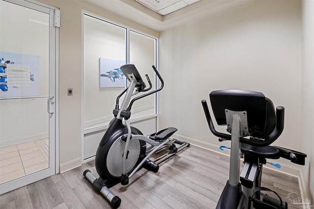 exercise area featuring light wood-type flooring