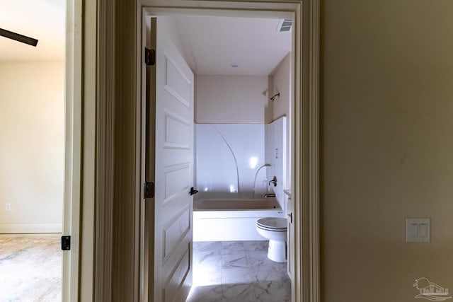 corridor featuring visible vents and marble finish floor