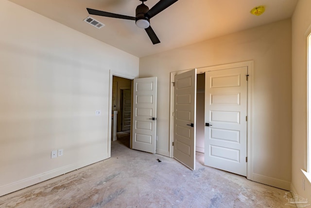 unfurnished bedroom featuring visible vents, baseboards, and concrete floors