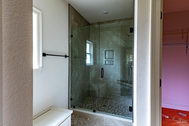 bathroom featuring a stall shower