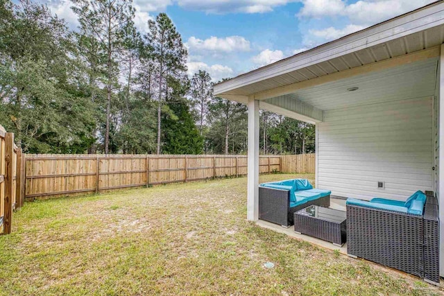 view of yard with a fenced backyard