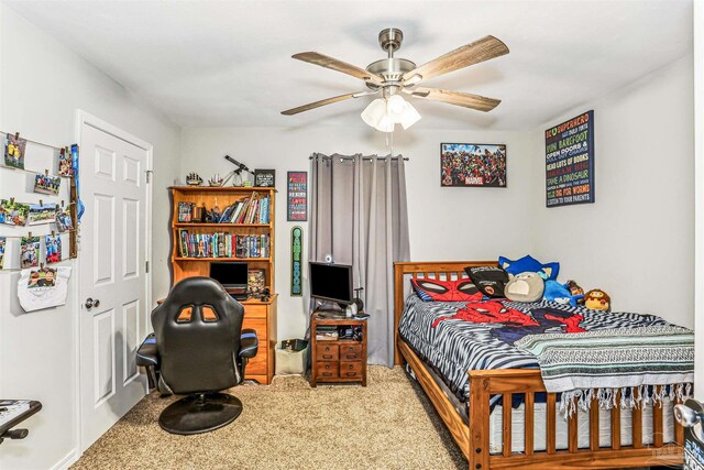 carpeted bedroom featuring ceiling fan