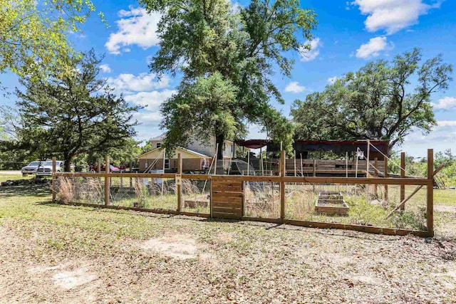 view of yard with a wooden deck