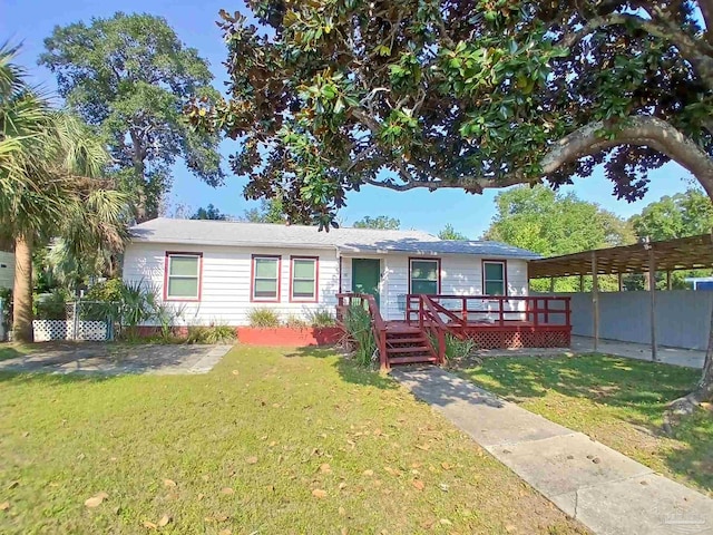 view of front of house featuring a deck and a front yard