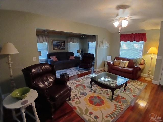 living room with hardwood / wood-style flooring and ceiling fan