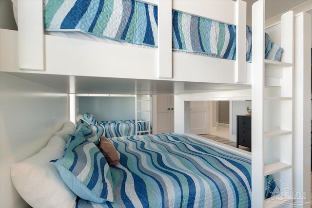 bedroom featuring hardwood / wood-style flooring