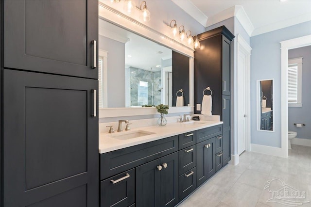 bathroom with vanity, tile patterned floors, toilet, ornamental molding, and an enclosed shower