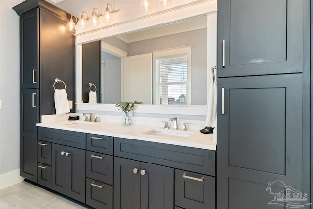 bathroom featuring tile patterned flooring and vanity