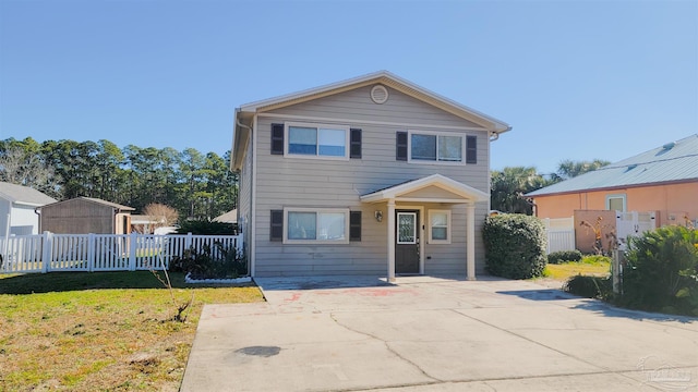 front of property featuring a front yard