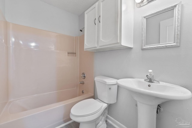 full bathroom with toilet, a sink, and bathing tub / shower combination