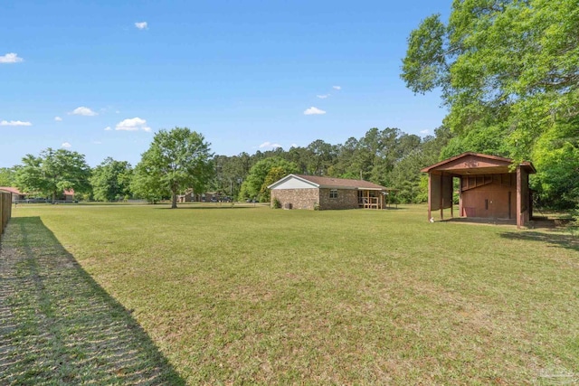 view of yard featuring a carport