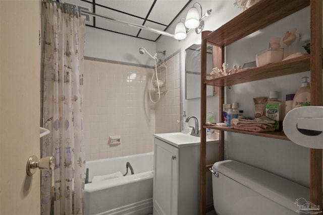bathroom featuring shower / tub combo with curtain, toilet, and vanity