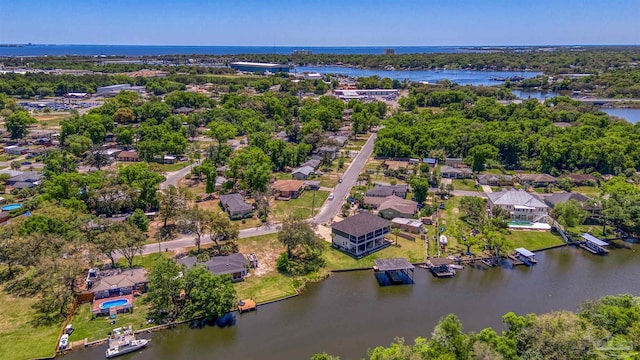 bird's eye view with a water view and a residential view