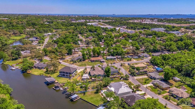 bird's eye view with a water view and a residential view